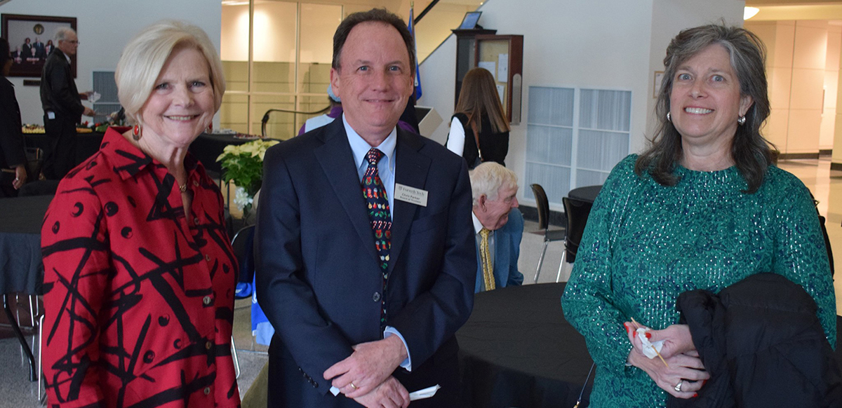 County Commissioner Gloria Whisenhunt greets board members at reception